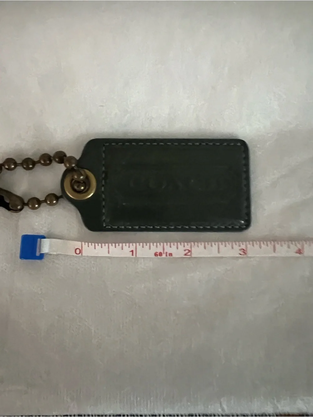 Coach Dark Green Patent Leather Hangtag